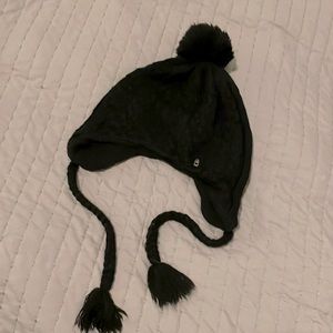 Black beanie hat with tassels by Ignite